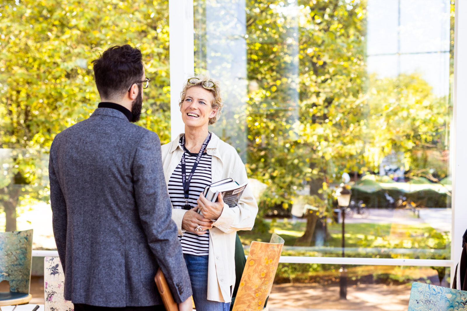 Two colleagues talking to each other