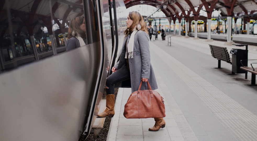 Woman entering a train
