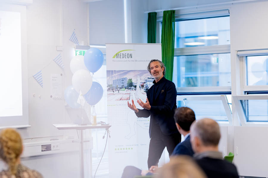 A man holding a lecture in a meeting room